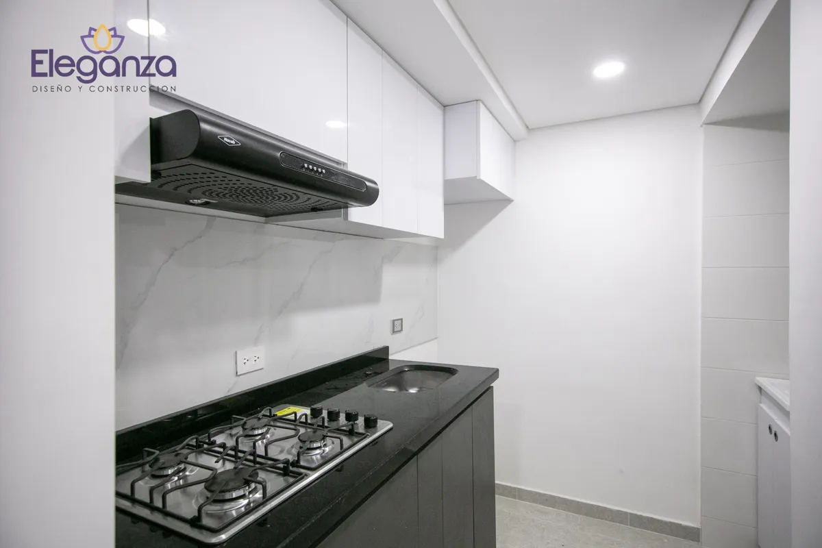 Cocina integral compacta negra blanca